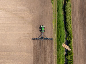 Aerial image of a tractor and planter